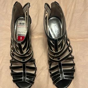 Black with silver trim high heel sandals size 8. Unique!